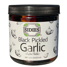 Load image into Gallery viewer, 16 ounce jar of black pickled garlic 
