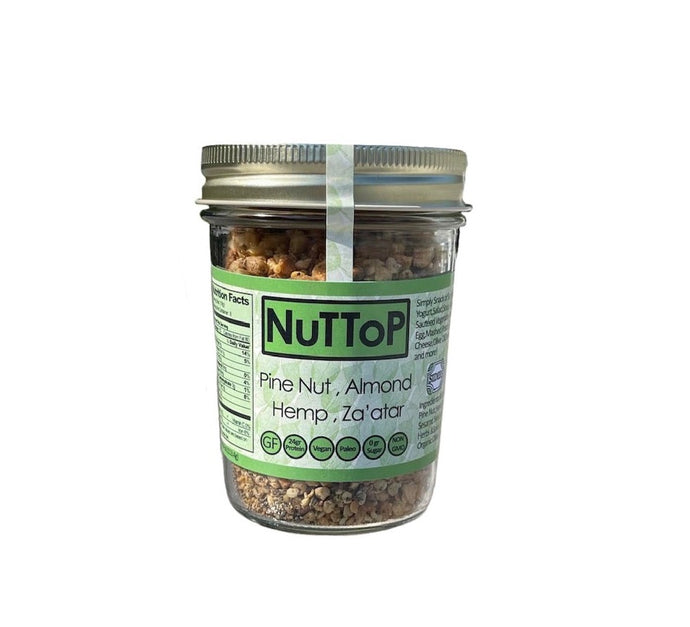 Jar of Nuttop zaatar, a roasted mix nut topping made of pine nut, almond and hemp seeds, seasoned with zaatar